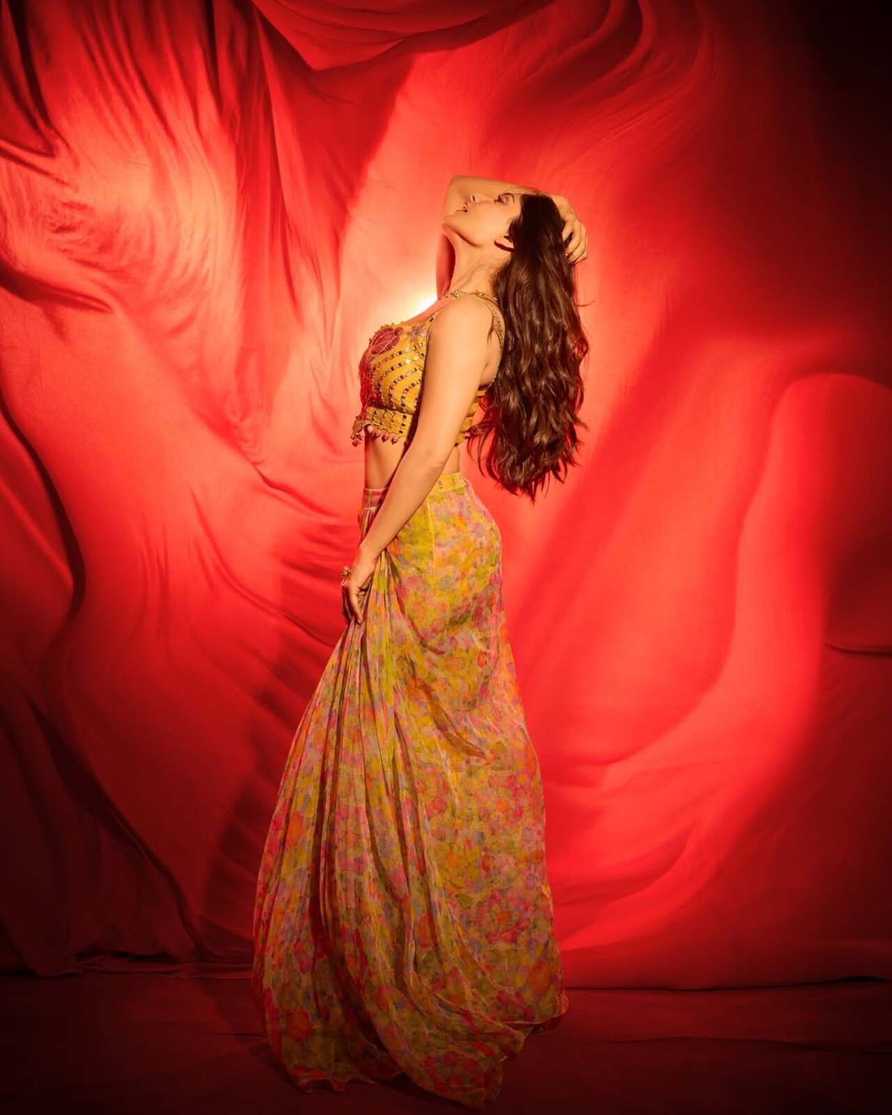 Bold colours and playful prints make this lehenga perfect for a high-energy sangeet night. The vibrant blouse adds festive sparkle, while the flowy skirt keeps it effortless. It’s youthful, fun and made for dancing the night away